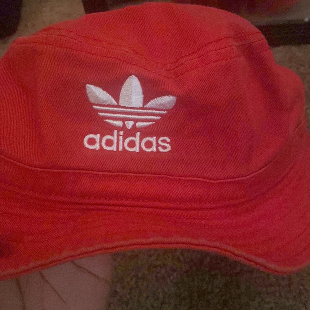 Red adidas’s bucket hat never wear anymore